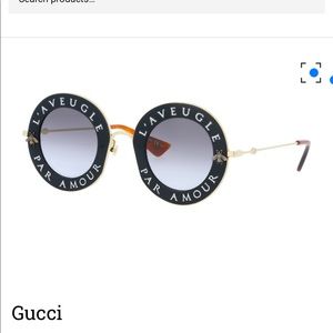 Gucci GG0113S 001 Black Sunglasses
This Plastic, Metal frame comes in Gucci 's